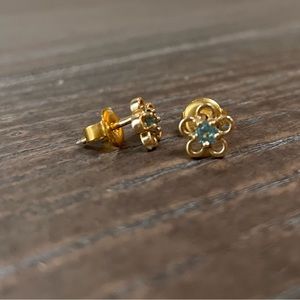 Little girl’s gold earrings